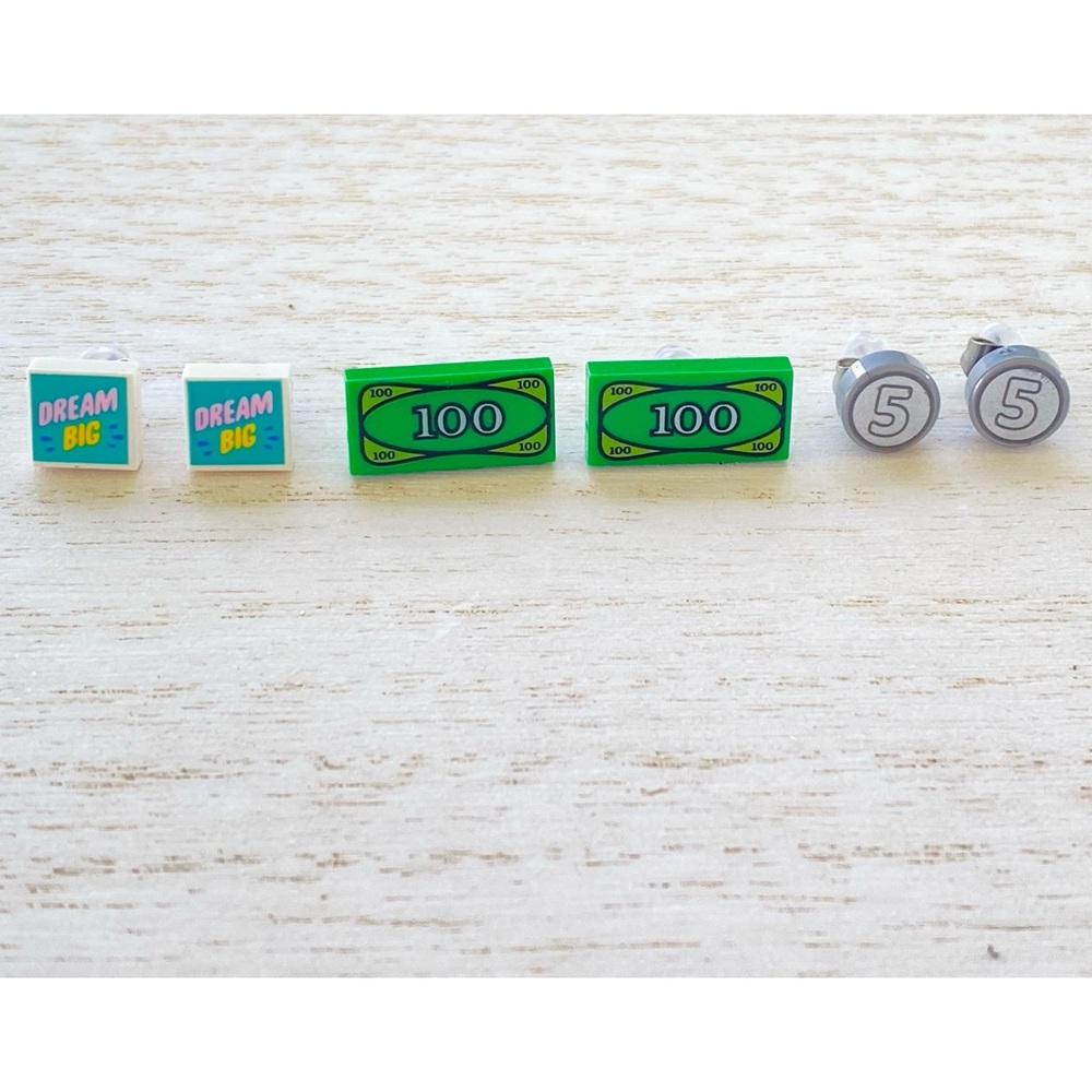 New set of 3 auth LEGO $100 bill, 5 cents and dream big earrings.